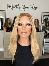 Load image into Gallery viewer, Charlie is a 21" layered length, medium cap made with premium Brazilian texture human hair