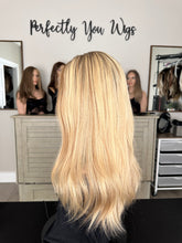 Load image into Gallery viewer, Charlie is a 21" layered length, medium cap made with premium Brazilian texture human hair