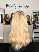 Load image into Gallery viewer, Charlie is a 21" layered length, medium cap made with premium Brazilian texture human hair