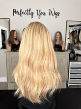 Load image into Gallery viewer, Charlie is a 21" layered length, medium cap made with premium Brazilian texture human hair