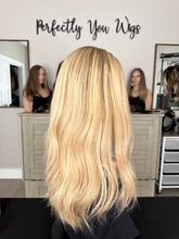 Load image into Gallery viewer, Charlie is a 21" layered length, medium cap made with premium Brazilian texture human hair
