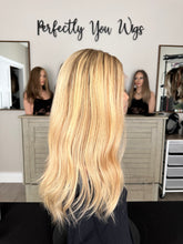 Load image into Gallery viewer, Charlie is a 21" layered length, medium cap made with premium Brazilian texture human hair