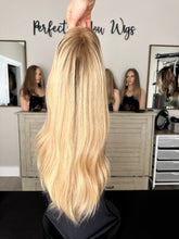 Load image into Gallery viewer, Charlie is a 21" layered length, medium cap made with premium Brazilian texture human hair
