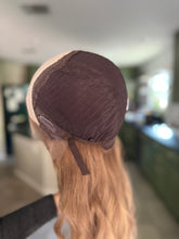 Load image into Gallery viewer, Izzy is a 20” layered length with face frame, medium cap made with premium Brazilian quality human hair
