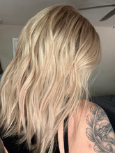 Load image into Gallery viewer, Avery is a 15” length with curtain bangs, medium cap made with premium Brazilian quality human hair
