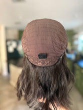 Load image into Gallery viewer, Monique is a 15" layered length, medium cap, and natural french silk top with lace front made with premium Euro texture hair
