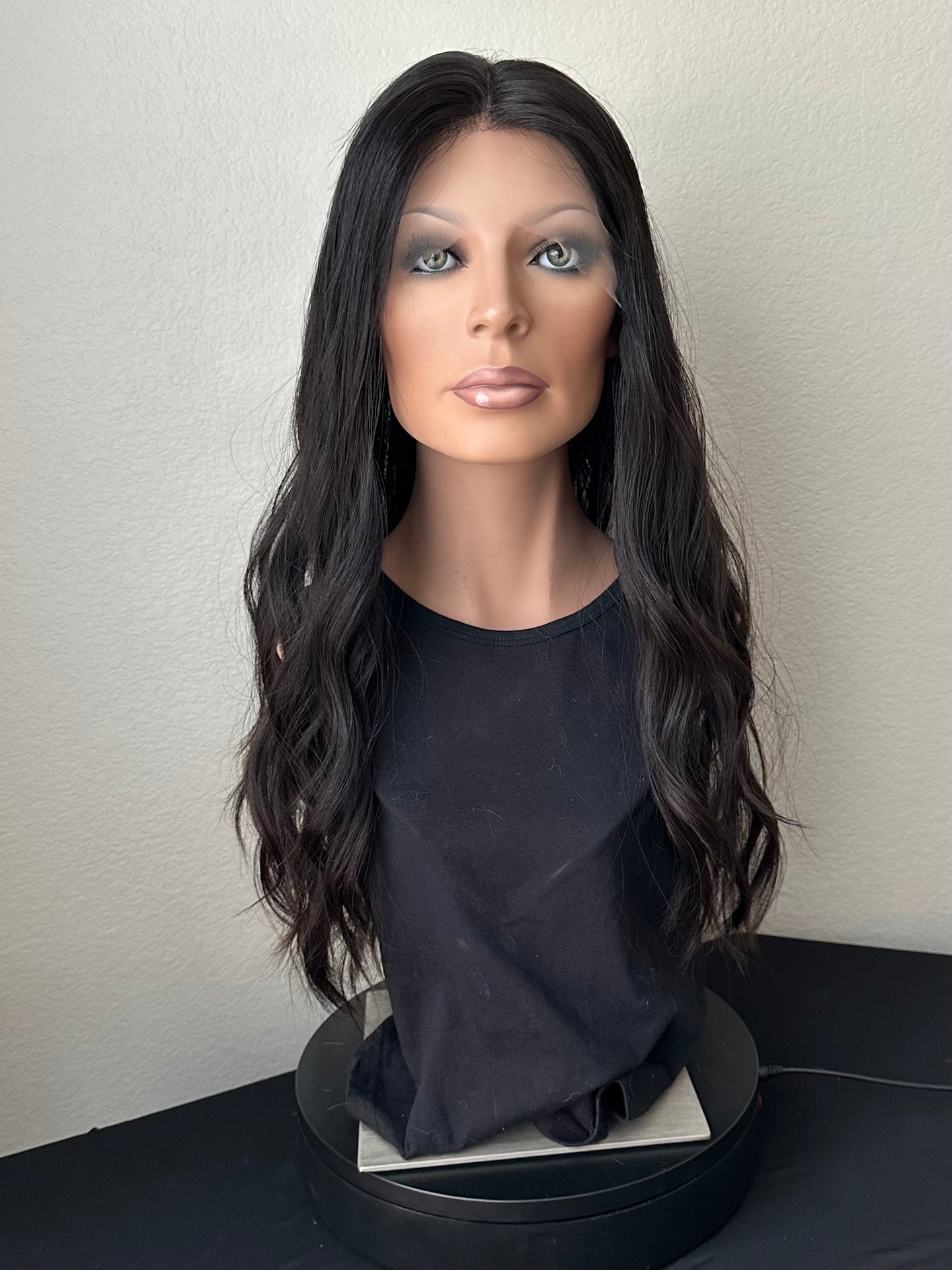 Jessie is a 26” layered length, 10X11 whopper style topper made with premium Euro quality human hair