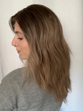 Load image into Gallery viewer, Arlie is an 18” layered length, medium cap made with premium Brazilian quality human hair
