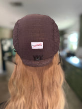 Load image into Gallery viewer, Izzy is a 20” layered length with face frame, medium cap made with premium Brazilian quality human hair

