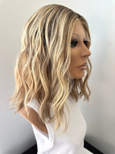 Load image into Gallery viewer, Devina is a 16&quot; length, XS cap made with premium Brazilian quality human hair
