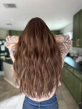 Load image into Gallery viewer, Dorothy is a large cap, 24” layered length ULTRA lightweight / low density cap made with premium Brazilian quality human hair
