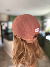 Load image into Gallery viewer, Arabella is a 15” length, medium cap made with premium Brazilian texture human hair
