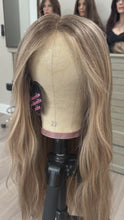 Load and play video in Gallery viewer, Gianna is a 25” layered length, medium cap made with premium Brazilian quality human hair
